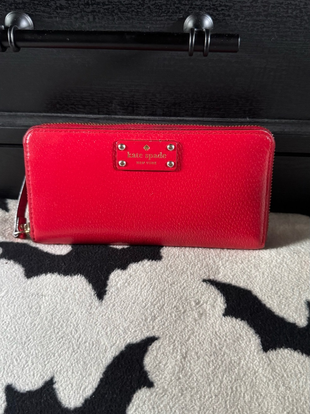 kate spade bright red zip-around wallet with gold plaque